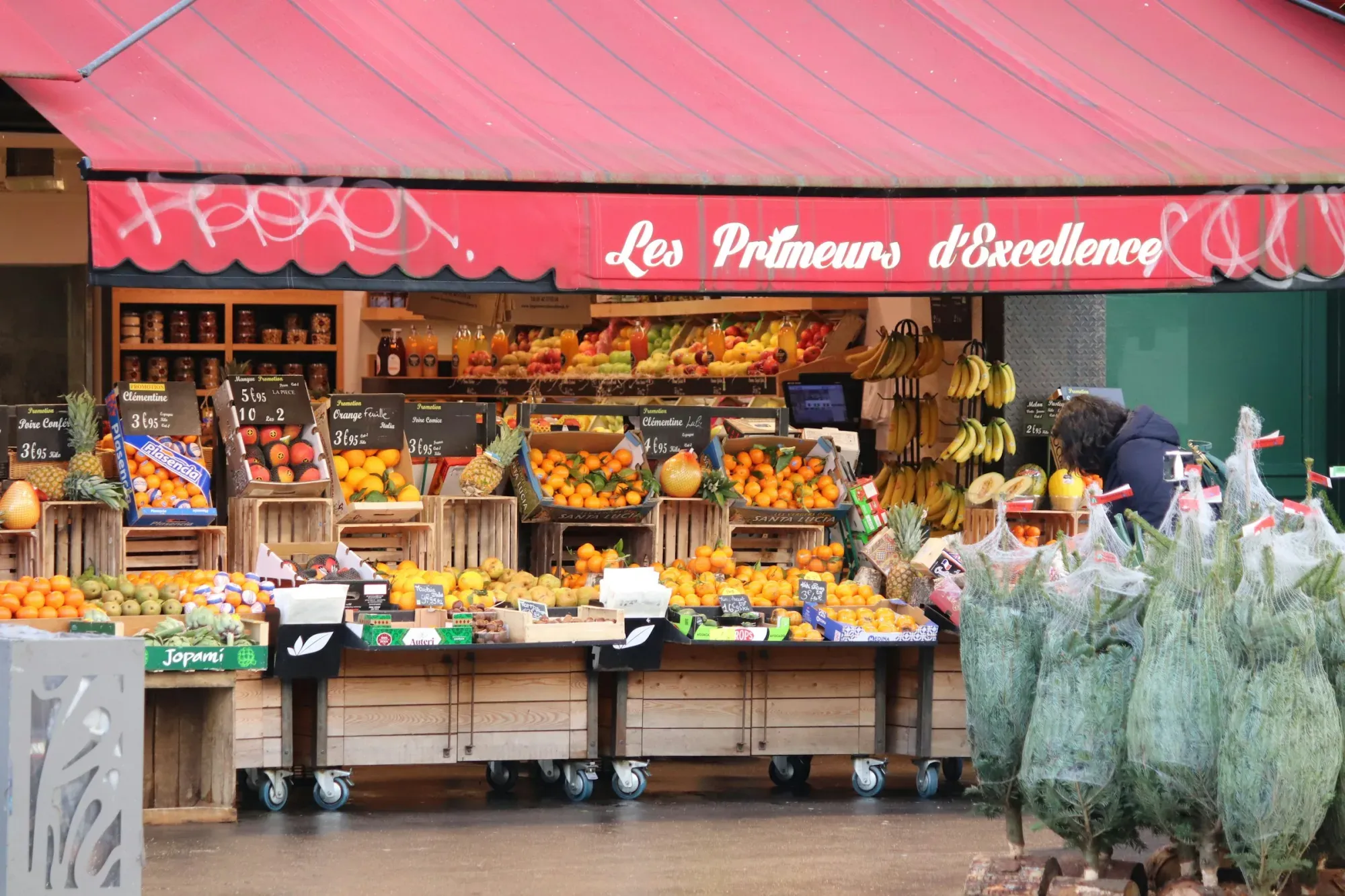 A fruit and vegetable stand displays its fresh produce.