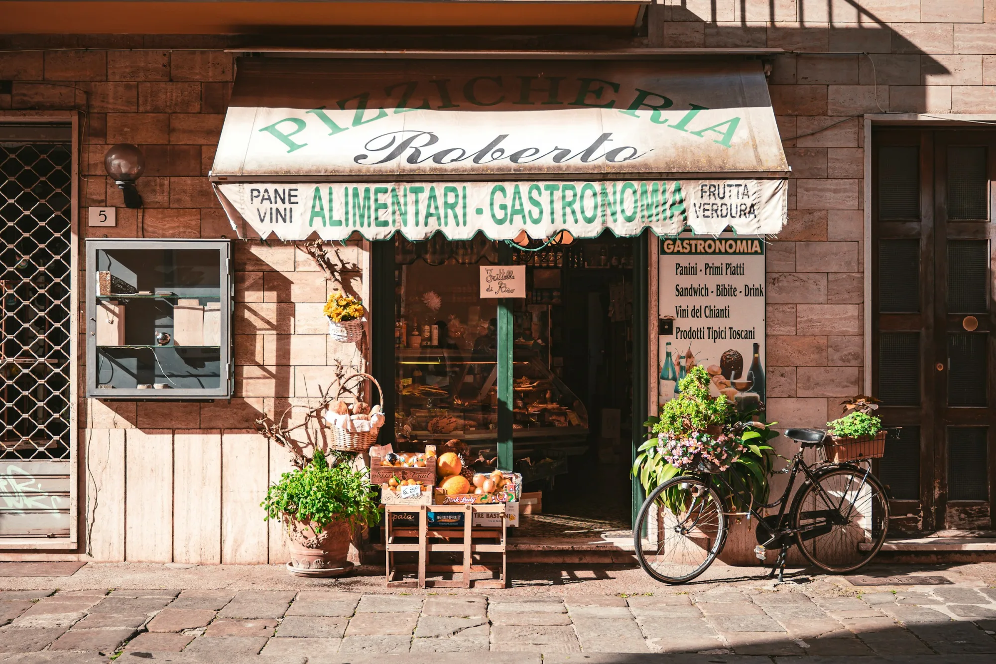 a bicycle is parked outside of a store