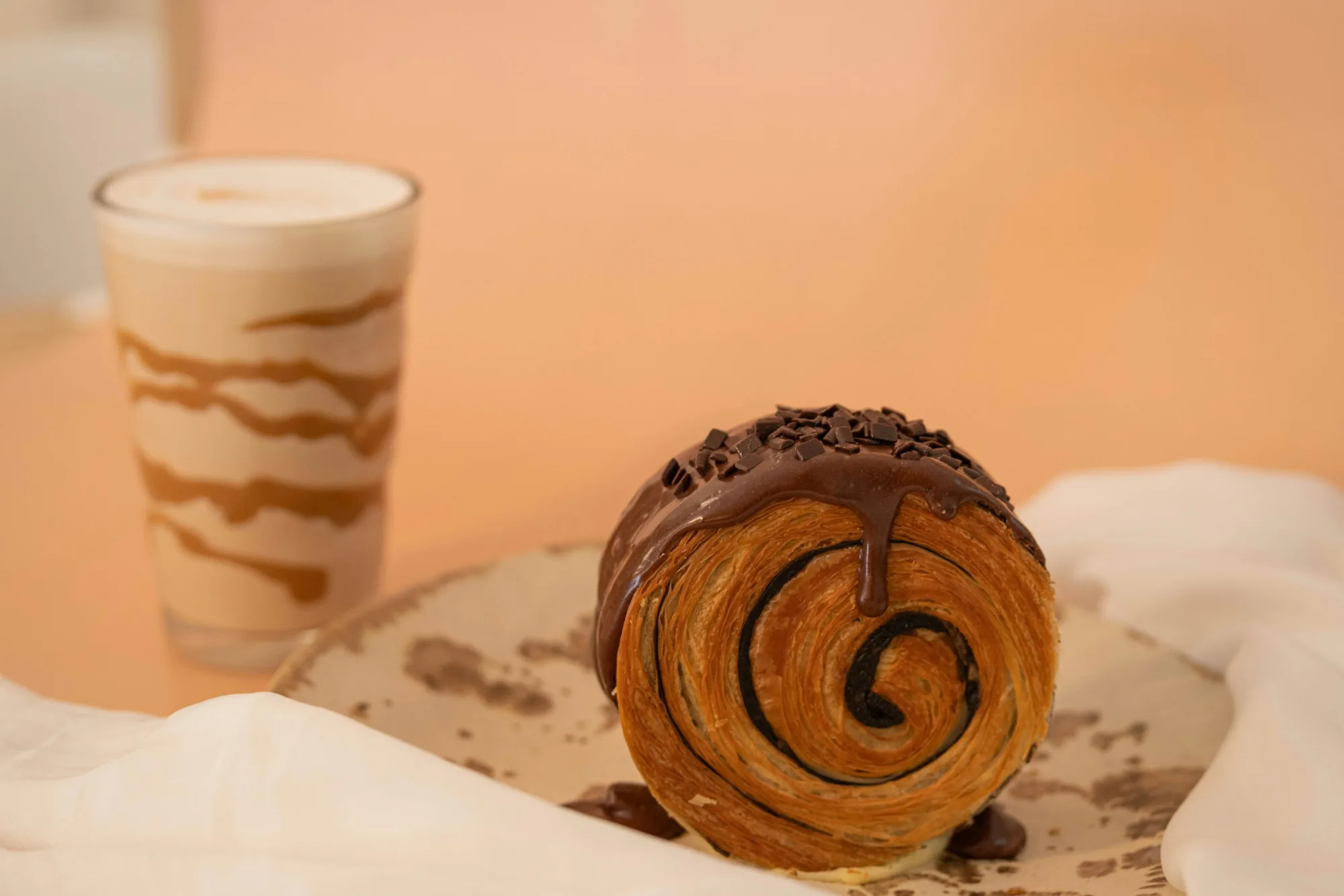 Chocolate pastry and drink create a delicious duo.