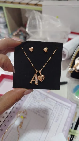 Coleccion:Collar con dije letra y corqzon + aretes